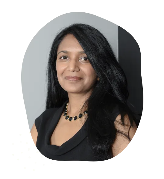 Portrait of Dr. Nimisha Singri smiling in professional attire
